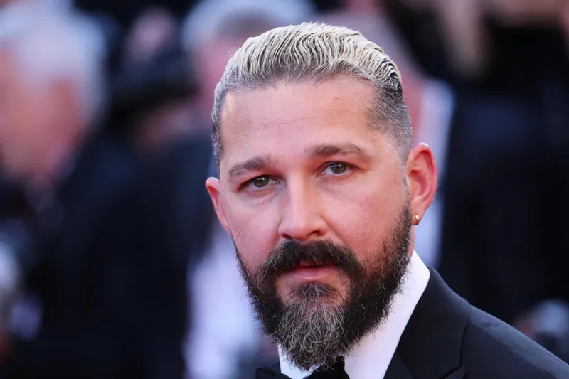 Shia LaBeouf on the red carpet at a film festival, after returning in auteur projects like Padre Pio and Megalopolis.