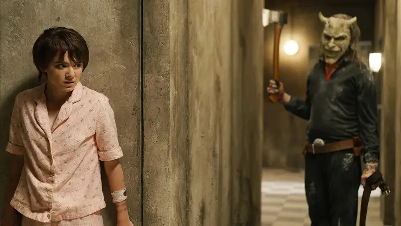 Ethan Hawke and Madeleine McGraw in a scene from The Black Phone 2
