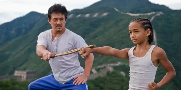 Jackie Chan mentors Jaden Smith in the 2010 remake of The Karate Kid (Credits: TMDB)
